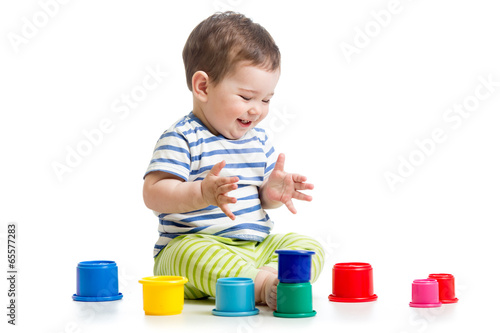 funny baby playing with col...