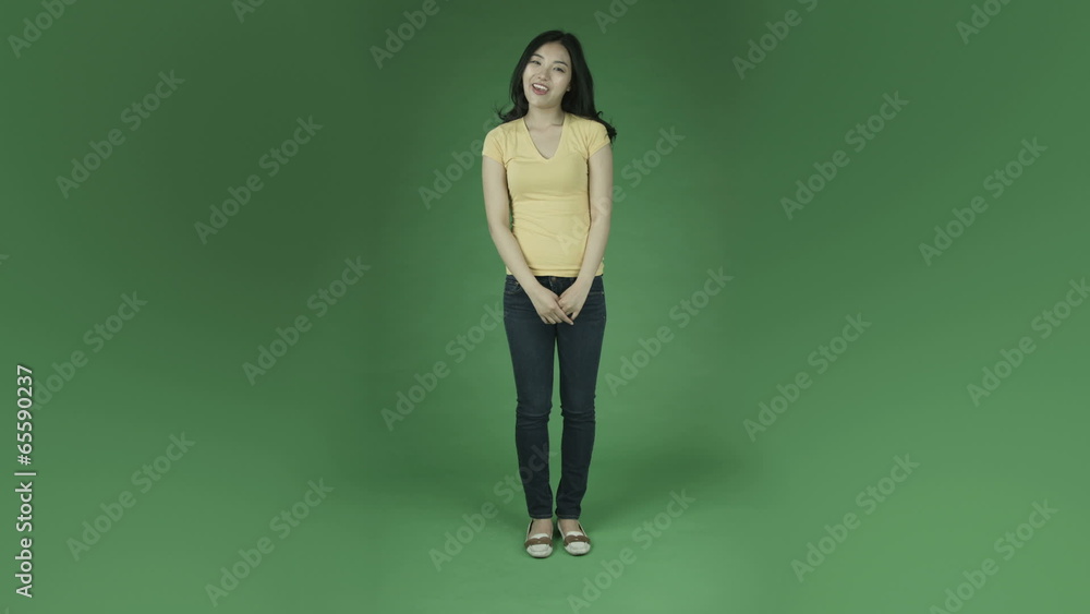 casual young asian adult woman isolated on green-screen casual young asian adult woman isolated on green-screen