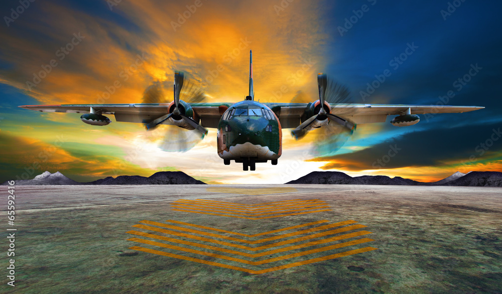Fototapeta premium lądowanie samolotu wojskowego na pasach startowych sił powietrznych przed pięknym dus