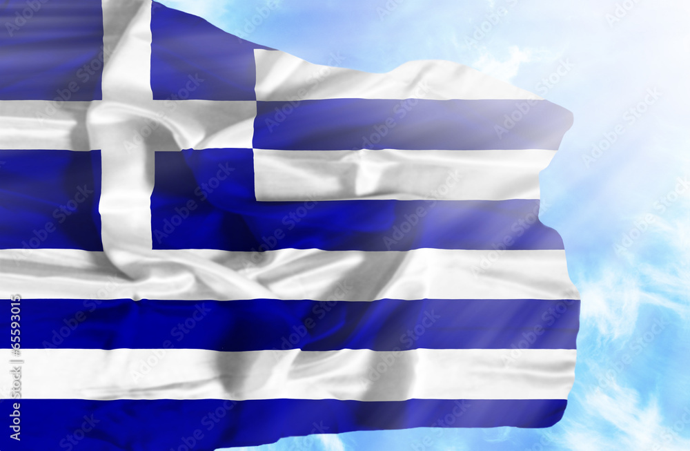 Greece waving flag against blue sky with sunrays Greece waving flag against blue sky with sunrays