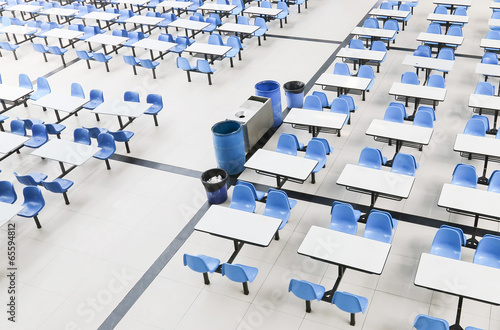 blue chair and table in restaurant hall