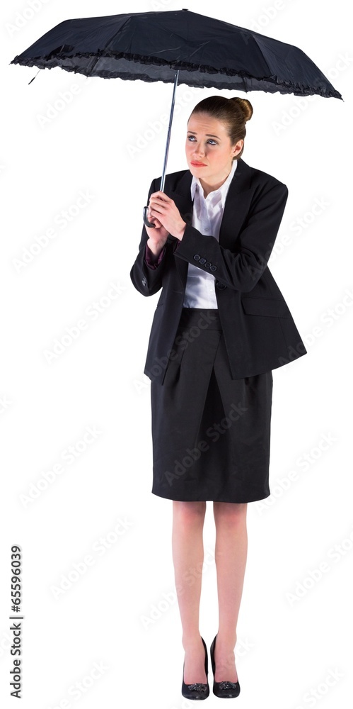 Businesswoman holding a black umbrella Businesswoman holding a black umbrella