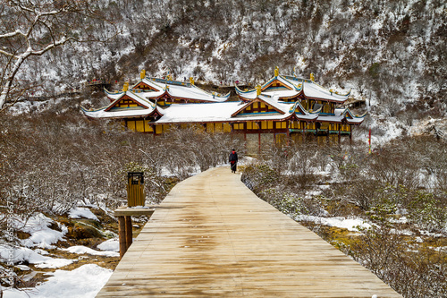 tibetan temple at huanglong in the winter, china photo