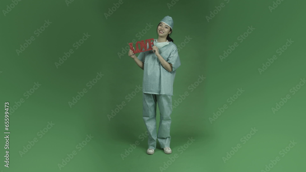 young asian adult woman doctor surgeon isolated on green-screen