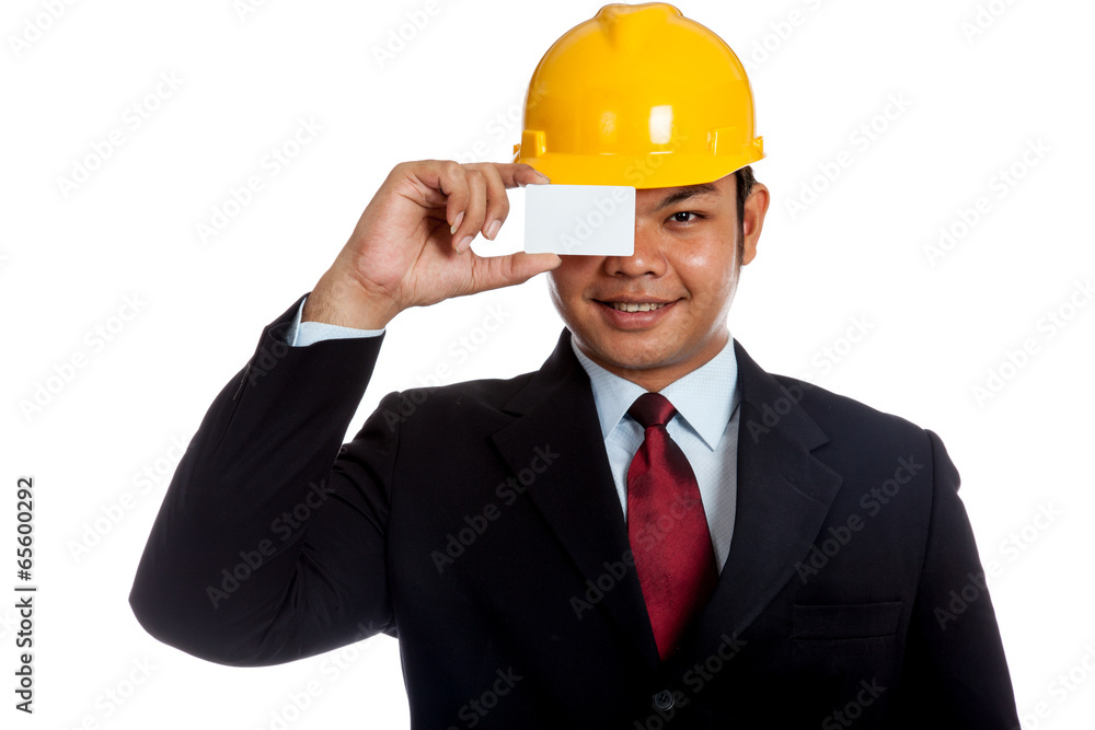 Asian engineer man close his eye with a blank card Asian engineer man close his eye with a blank card