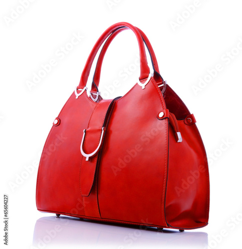 Red handbag on white background