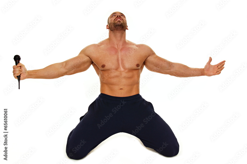 Karaoke with young muscular man without shirt