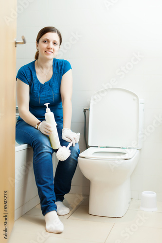 Smiling  woman in bathroom