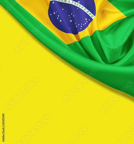 Flag of Brazil on yellow ba...