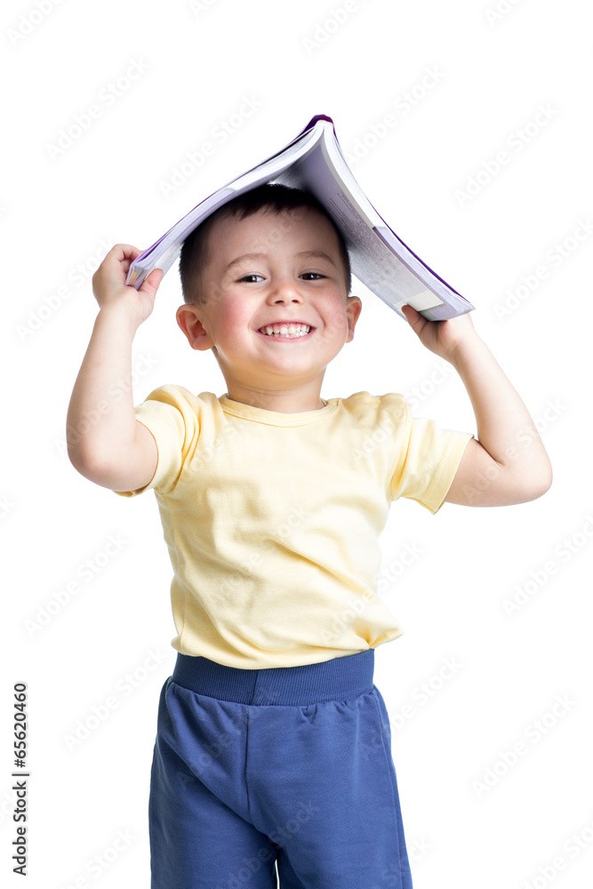 preschooler child with a book over his head isolated over white preschooler child with a book over his head isolated over white