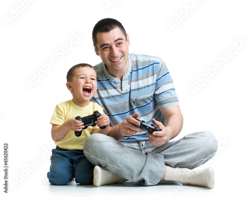 man and his son child play with a playstation together