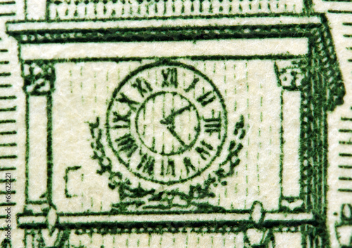 Dollar USA, clock. Extreme closeup.Macro
