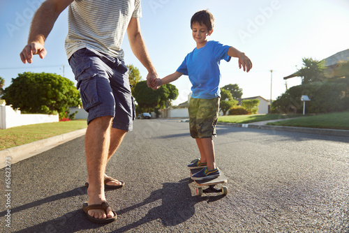 father son skateboard