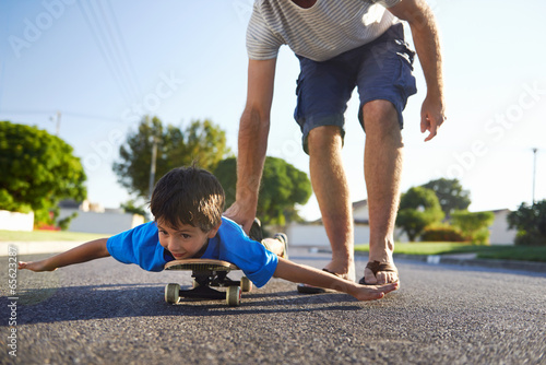 father son skateboard