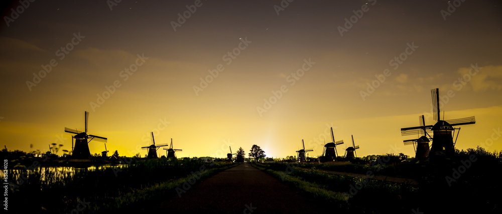 Picturesque landscape with windmills Picturesque landscape with windmills