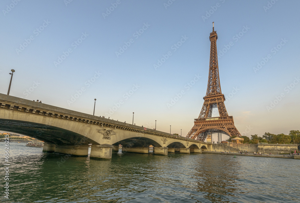 Eiffel Tower and Seine River at sunset