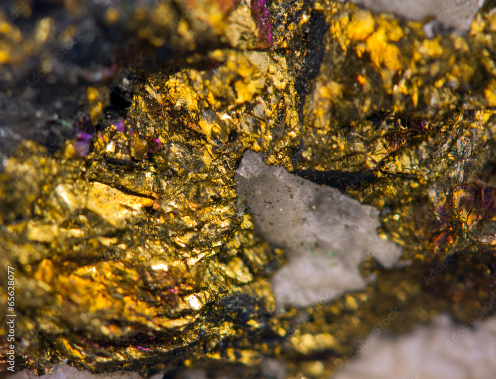Nugget, golden metal. Macro. Extreme closeup Nugget, golden metal. Macro. Extreme closeup