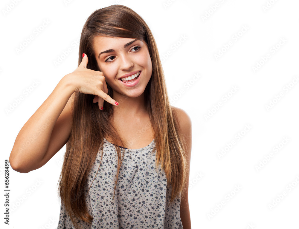 young woman doing a call gesture isolated on white young woman doing a call gesture isolated on white