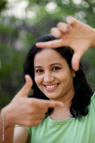 Woman making frame with her hands