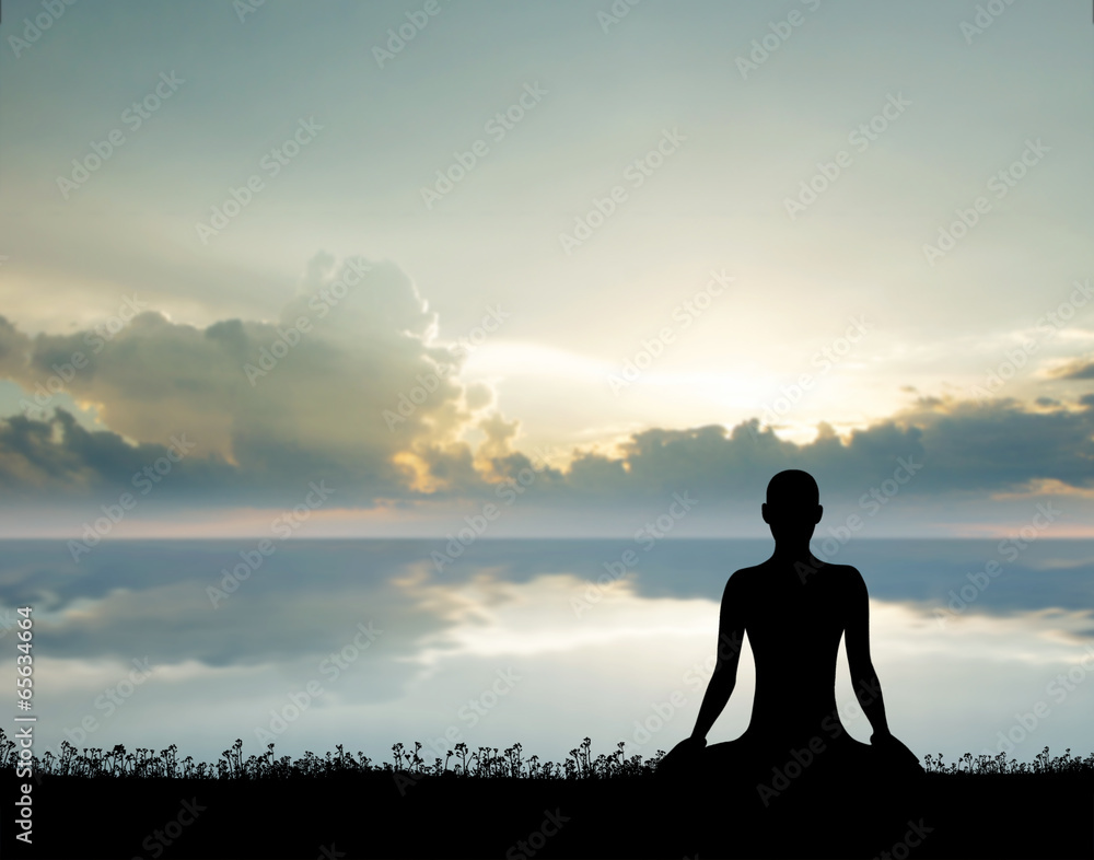 Sunrise meditation. Silhouette of a woman doing yoga exercise.