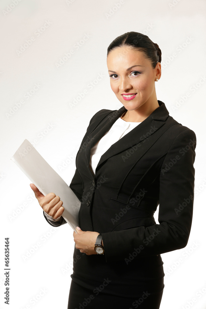 Black hair business dressed woman holding white book Black hair business dressed woman holding white book