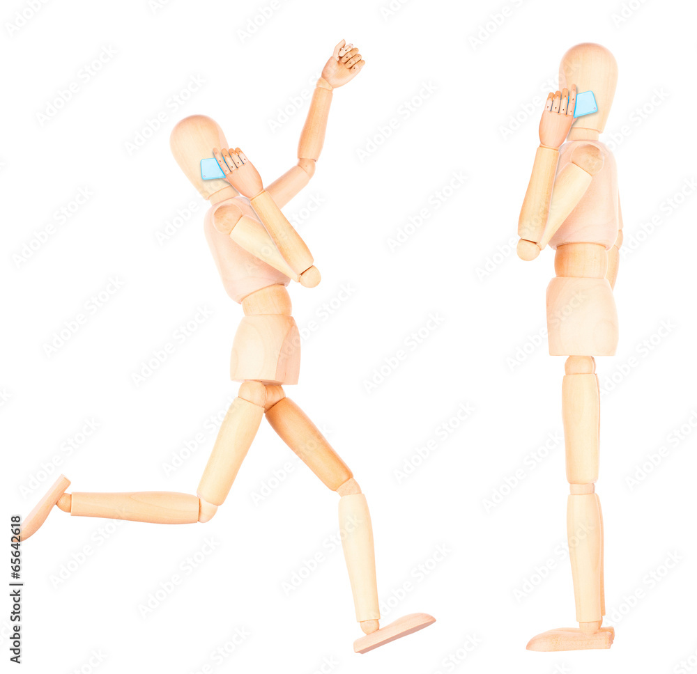 wooden Dummy talking on mobile phone wooden Dummy talking on mobile phone