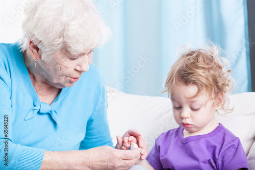 Boy spending time with grandma