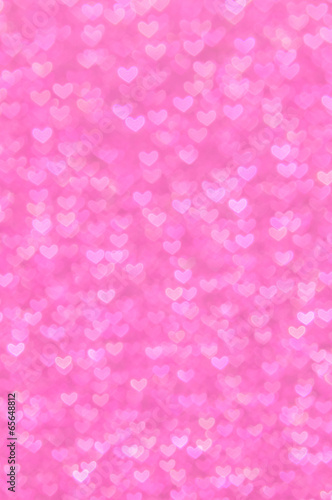 defocused abstract pink hearts light background