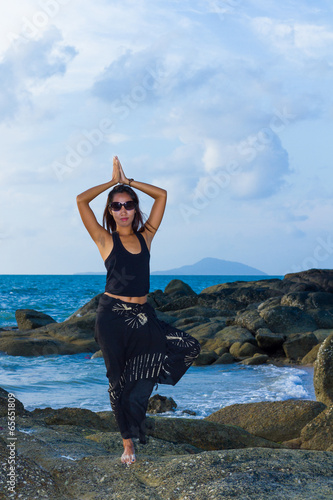 Beautiful Asian model posing on the beach