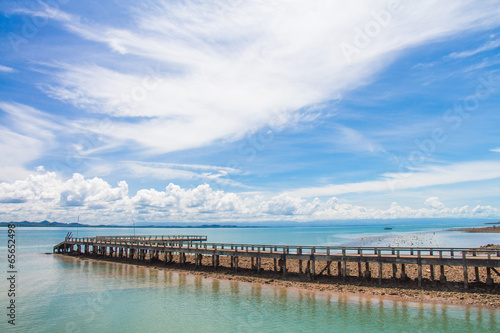 Wooden bridge into the sea