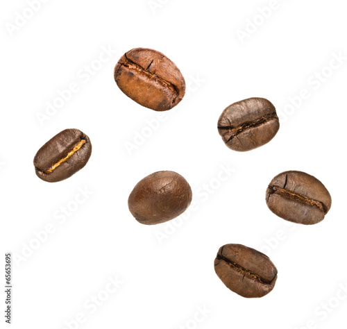 Coffee beans on wood background