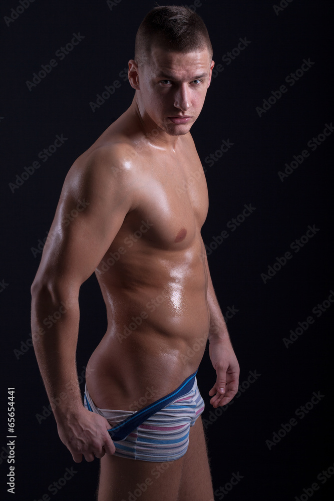 Portrait of fashion young caucasian sexy muscled attractive hand