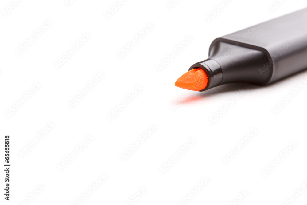 Orange highlighter pen isolated over white. Orange highlighter pen isolated over white.