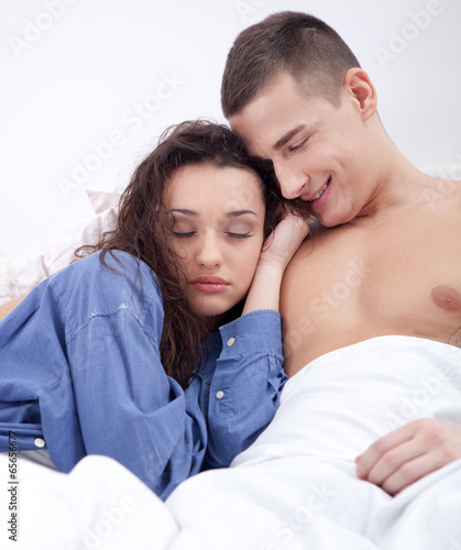 couple in love lying in bed
