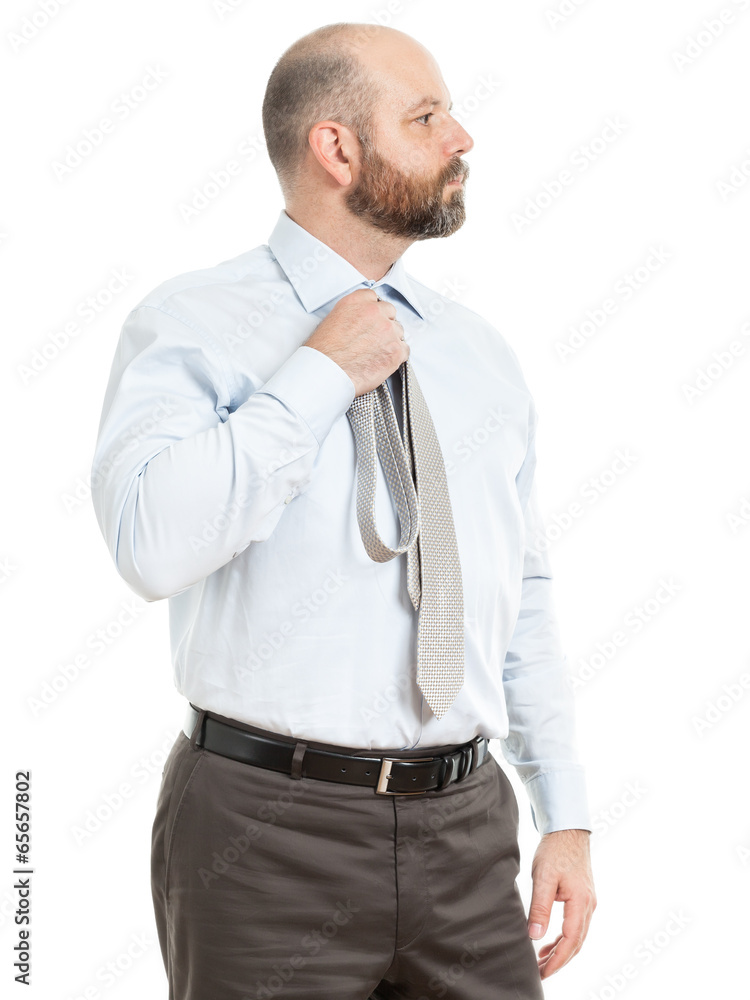 business man selects tie business man selects tie