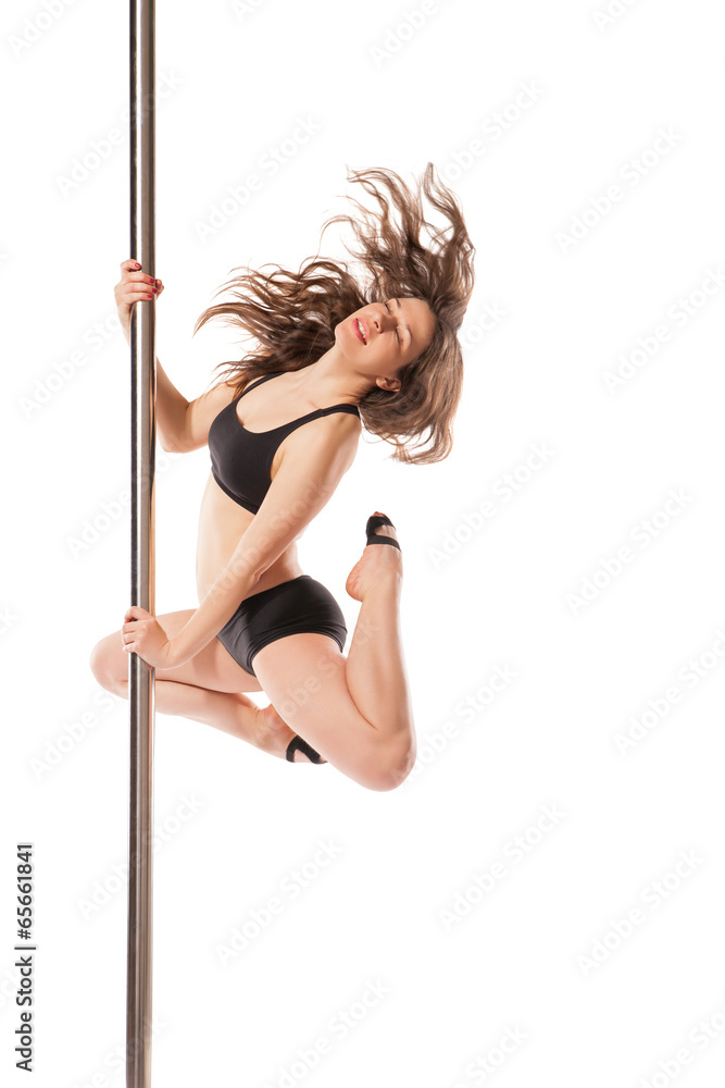 Young sexy woman exercise pole dance against white Young sexy woman exercise pole dance against white