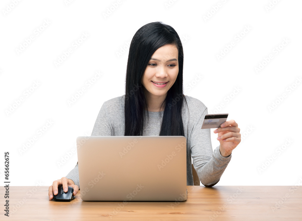 Woman using laptop computer for online shopping Woman using laptop computer for online shopping
