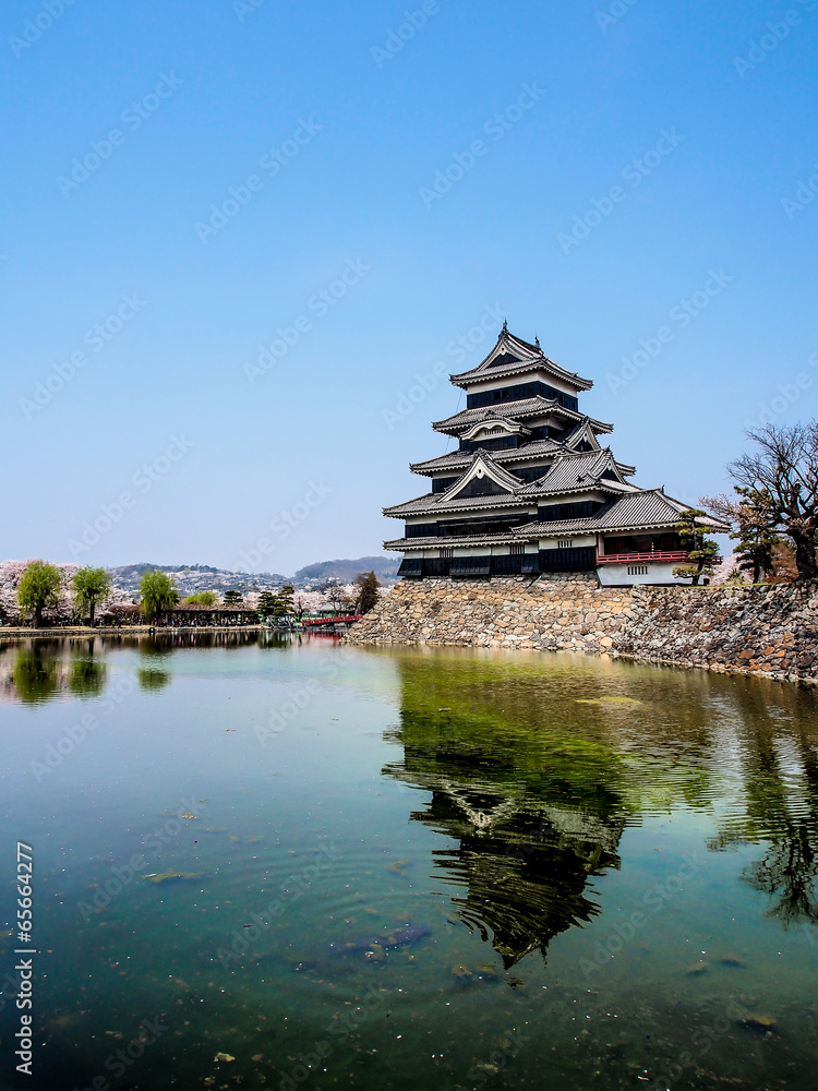 Matsumoto castle with blue sky in spring season Matsumoto castle with blue sky in spring season