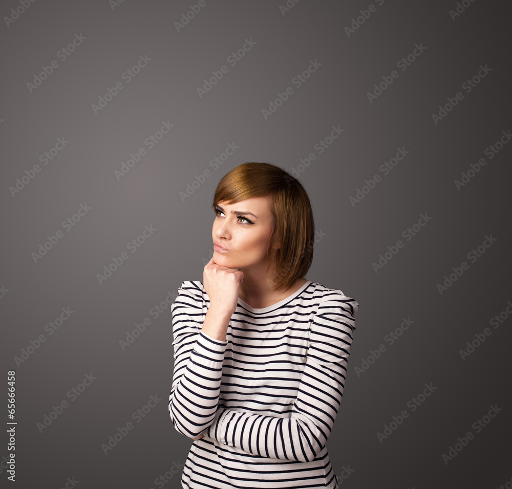 Young woman thinking with copy space Young woman thinking with copy space