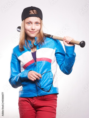 Portrait of a teen girl with bat photo