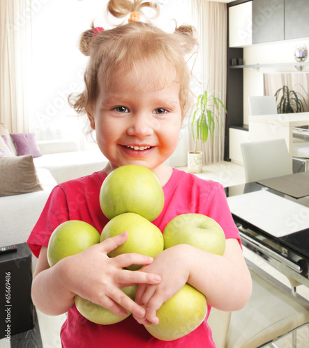 Child with apples photo