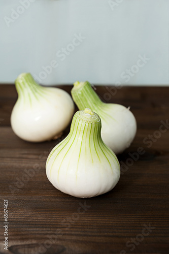Onion on wooden desk