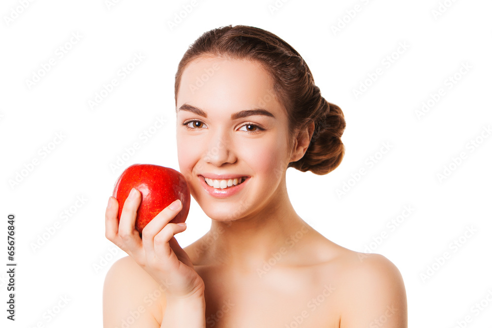 Smiling beauty holding red apple while isolated on white Smiling beauty holding red apple while isolated on white