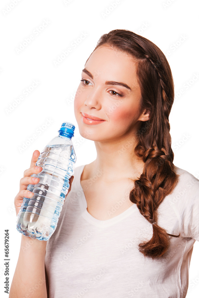 Beautiful woman holding bottle of water. on a diet Beautiful woman holding bottle of water. on a diet