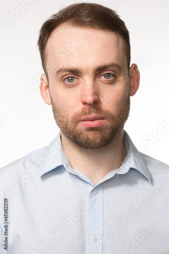 Portrait of a young man with a serious expression