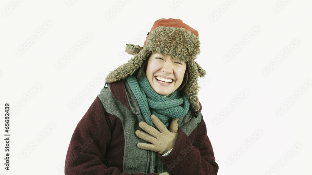 caucasian girl with winter clothes isolated on white laughing caucasian girl with winter clothes isolated on white laughing
