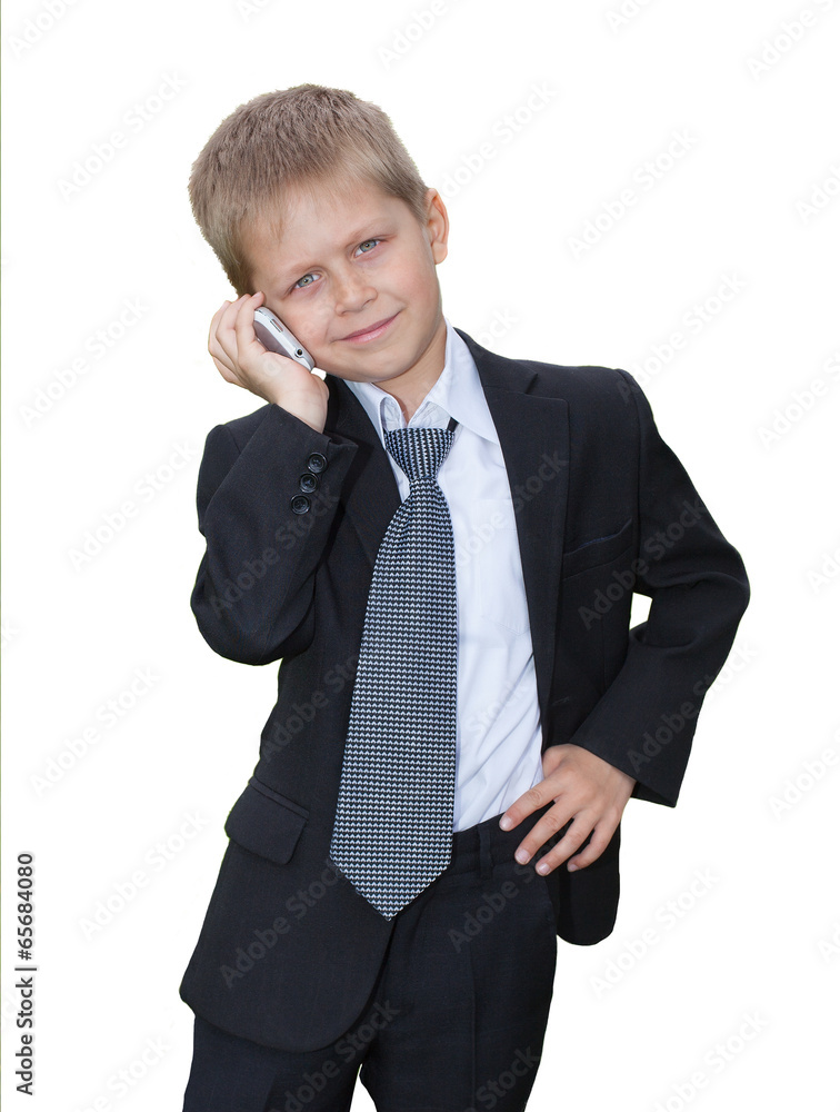 Young boy talking on the smartphone, isolated on white backgroun Young boy talking on the smartphone, isolated on white backgroun