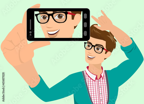 Happy guy is taking selfie