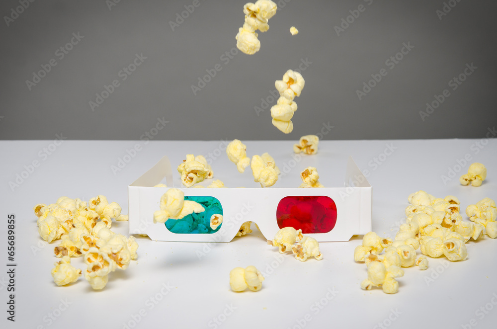Naklejka premium 3d glasses with falling popcorn