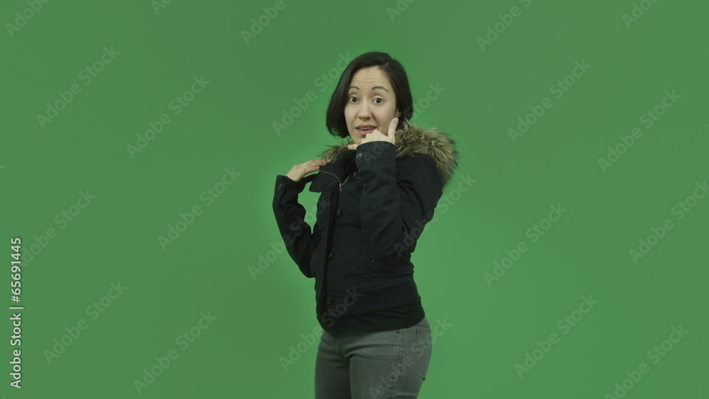 caucasian girl with winter jacket isolated on green screen with caucasian girl with winter jacket isolated on green screen with